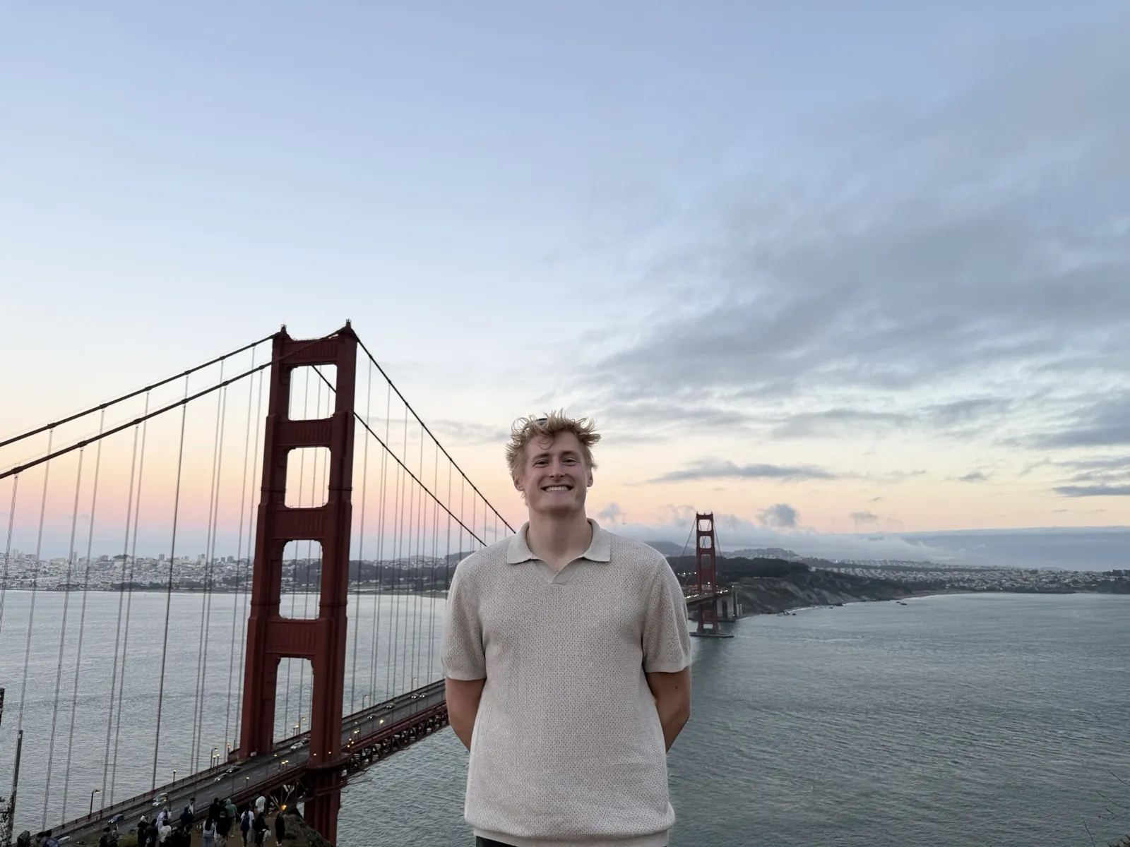 Zander Dent in front of the Golden Gate Bridge at dusk
